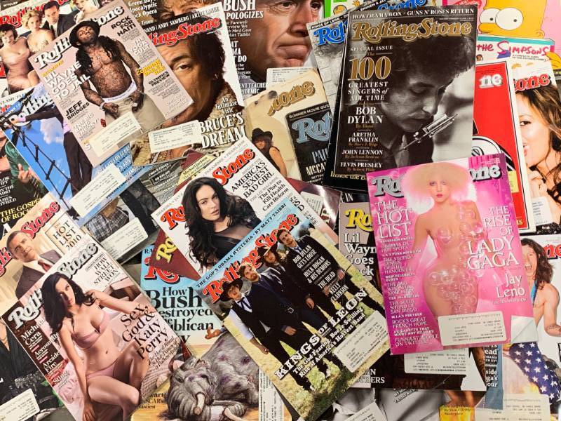 lot 128 image: Large Lot of Rolling Stones Magazines & 2 Simpsons Books