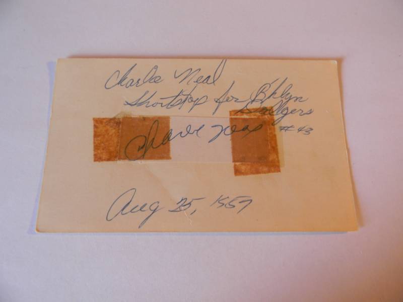 lot 30 image: CHARLIE NEAL AUTOGRAPH - ORIGINAL - SIGNED AUG 25TH 1957 - 3 All-Star (19591960) World Series champion (1959) Gold Glove Award (1959)