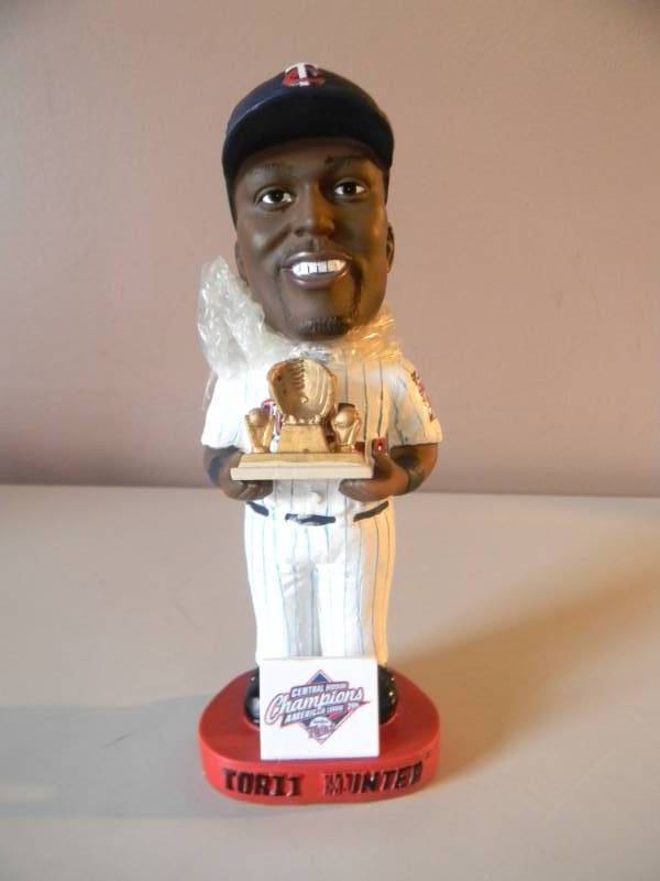 lot 31 image: TORII HUNTER GOLD GLOVE BOBBLEHEAD - VERY COOL - NEW IN BOX - SEE PICTURES