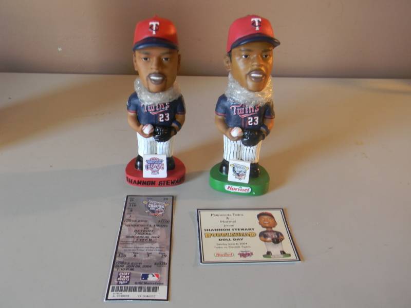 lot 43 image: 2 Minnesota Twins Bobble Heads Shannon Stewart Season Ticket Bobblehead BACK TO BACK TO BACK 02,03,04 & 2003 CENTRAL DIVISION CHAMPIONS - GREAT SET - NEW IN BOX - SEE PICTURES