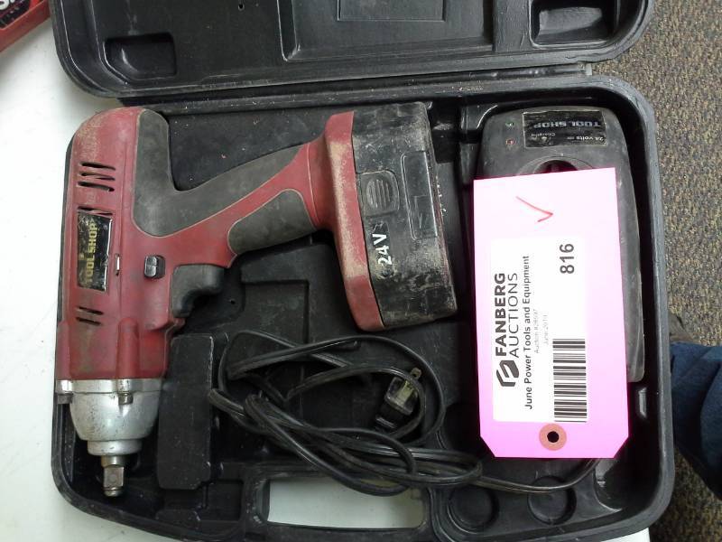 lot 816 image: Tool Shop 24VDC 12in. Impact Wrench, Battery, Charger, Case