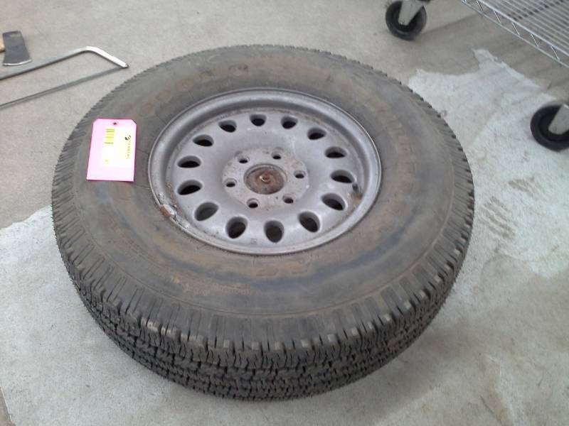 lot 385 image: Firestone P26575R16 114S MS Passenger Tire with 16in. 5-Lug Steel Wheel