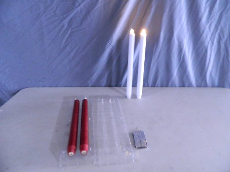 lot 24 image: 4 Genuine Luminara Flameless Candlesticks