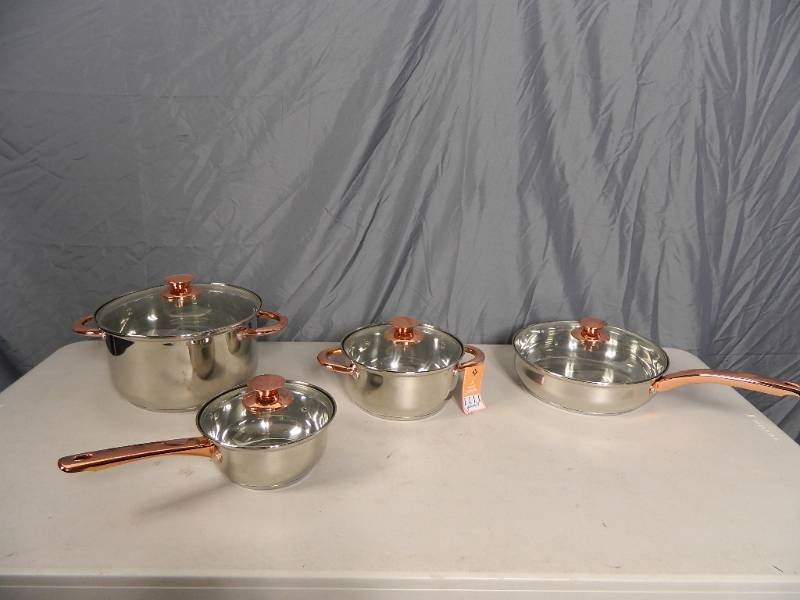 lot 25 image: New 8 Piece Rose Gold Stainless Elle Decor Pot and Pan Set
