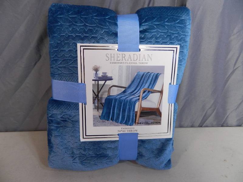 lot 76 image: New Sheridan Embossed Flannel Throw