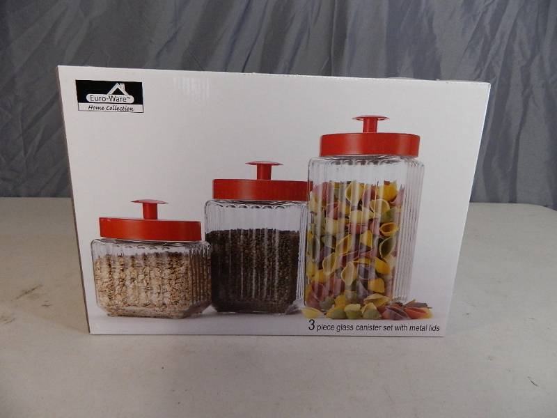 lot 91 image: New 3 Piece Glass Canister Set with Red Lids
