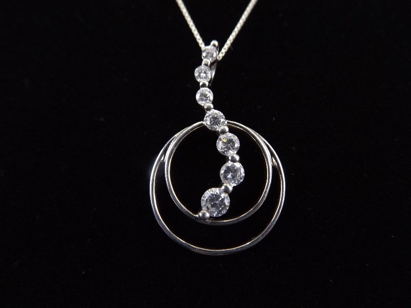 lot 32 image: .925 Sterling Silver Graduated Crystal Hoop Pendant Necklace