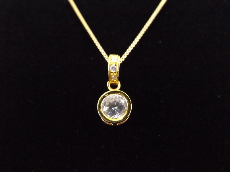 lot 34 image: .925 Sterling Silver Faceted Crystal Pendant Necklace