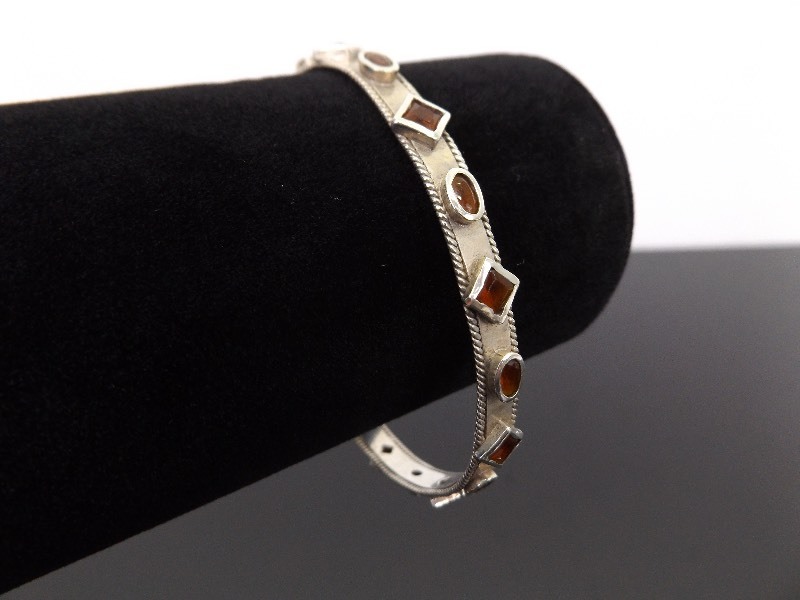 lot 52 image: .925 Sterling Silver Spessartite Garnet Bangle Bracelet