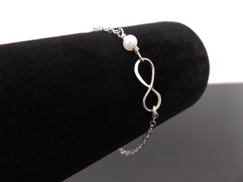 lot 59 image: .925 Sterling Silver Cultured Pearl Infinity Bracelet