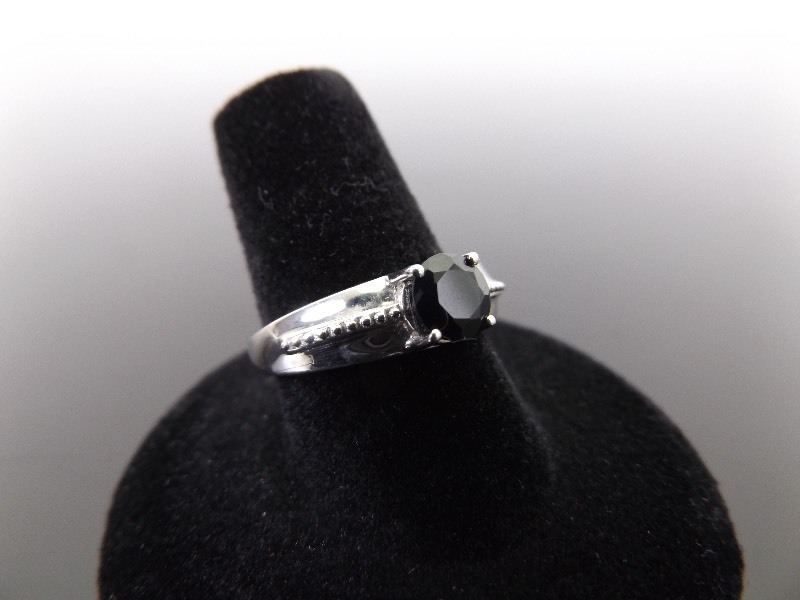 lot 84 image: .925 Sterling Silver Faceted Black Onyx Ring Size 8.5