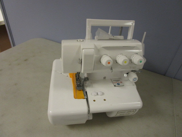 lot 409 image: BABY LOCK COVER STITCH SERGER MACHINE
