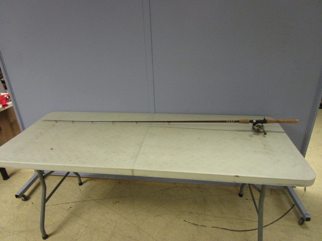 lot 524 image: FENWICK FISHING POLE WITH QUANTUM IRON REEL