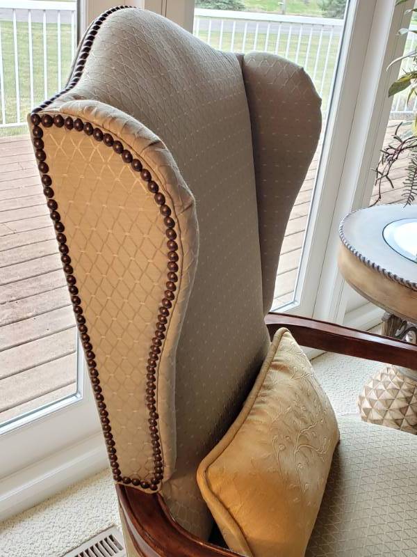 lot 29 image: Exposed Thumbnail Upholstered Wing Back Chair
