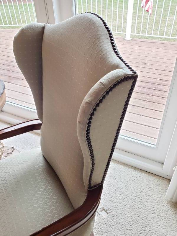 lot 30 image: Exposed Thumbnail Upholstered Wing Back Chair