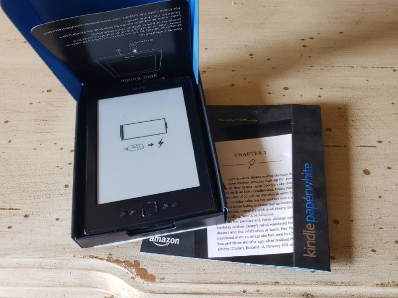 lot 44 image: Amazon Kindle, Cordless Phones, and Fax Machine
