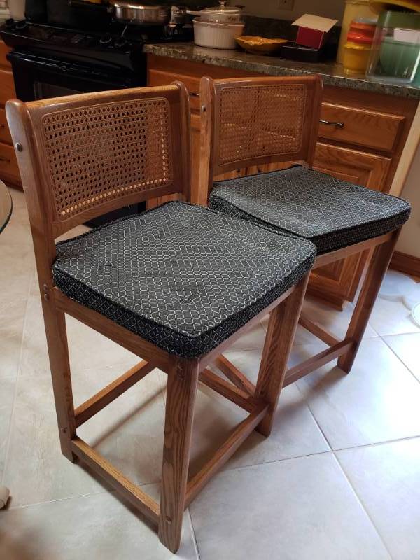 lot 85 image: High Top Upholstered Cane Backed Chairs