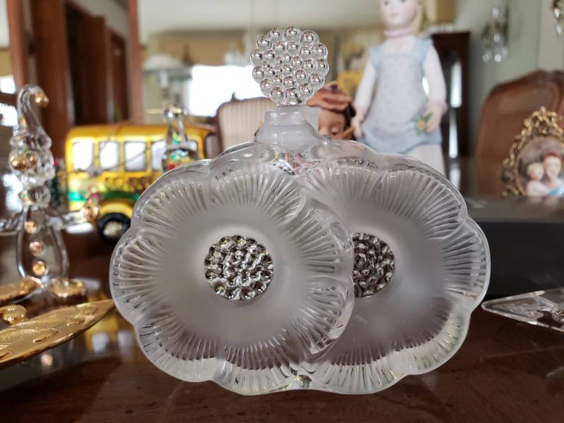 lot 87 image: Lalique Sunflower Perfume Bottle, Swarovski, Waterford Crystal Stopper, and More