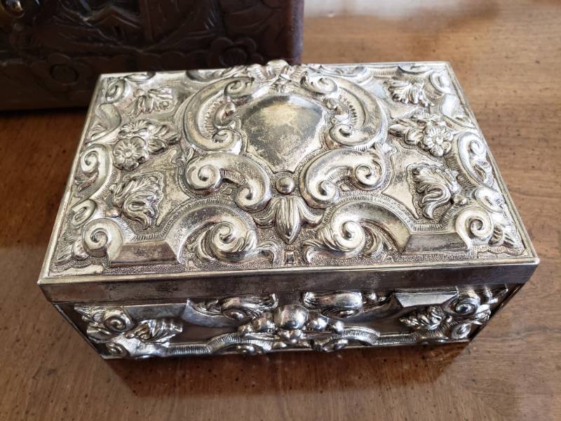 lot 90 image: Ornate Silver Colored and Carved Wooden Dresser Boxes