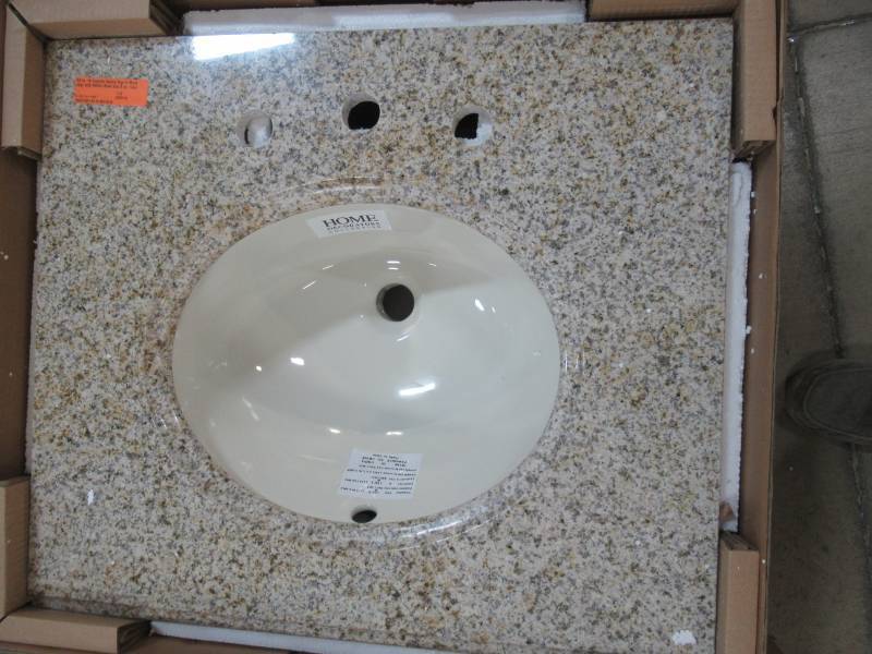 lot 62 image: Home Decorators Collection Pegasus 25 X 22 Deep Granite Vanity Top in Montesol with White Bowl and 8 in. Faucet Spread - Slight Crack