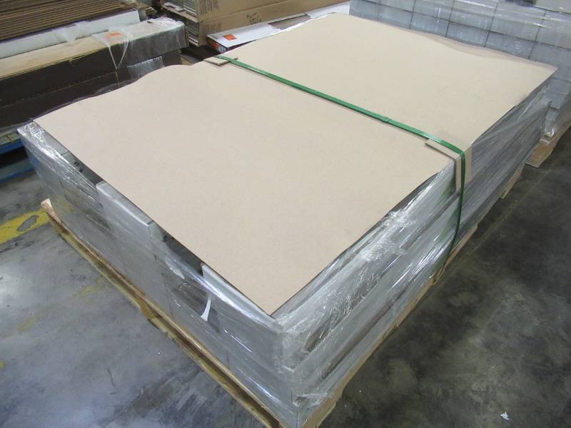 lot 26 image: UNIBOARD Galapagos Oak Luxury Laminate Flooring- 8 plankscase (17.34 sq ft.case) - 11 Cases. Model UL000315