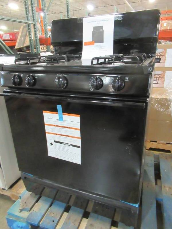 lot 32 image: GE 30 in Hotpoint Freestanding Gas Range in Black, RGB525DEH3BB - DentsScratches on Back of Range Top Hinged Area, Slight Ding on RH Front Door