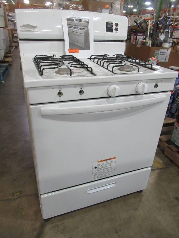 lot 34 image: Amana 30 Amana Freestanding Gas Range in White - AGR4230BAW0 - Some Scratchesdents, Missing 3 Knobs and Broiler Pan.