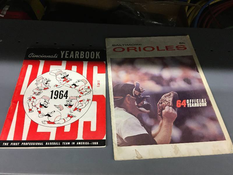 lot 302 image: 1964 Cincinnati Reds Yearbook & 1964 Baltimore Orioles Yearbook