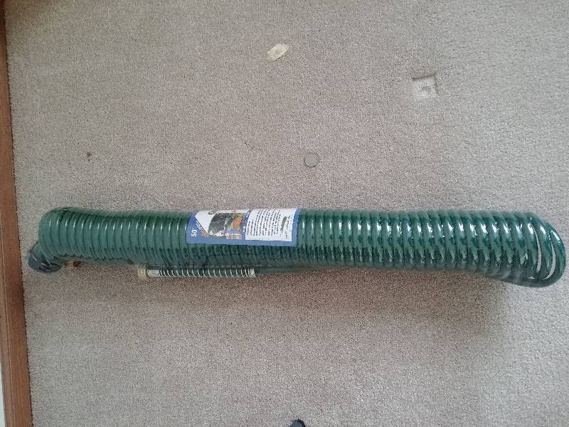 lot 27 image: as-new 50 coil hose
