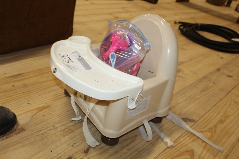 lot 375 image: Plastic high chair and small child dishes