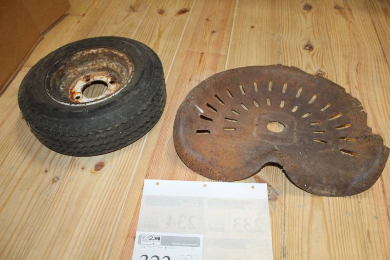 lot 323 image: Antique metal tractor seat.