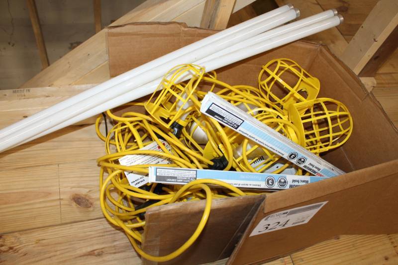lot 324 image: 100 construction light string, works well. Includes florescent bulbs.
