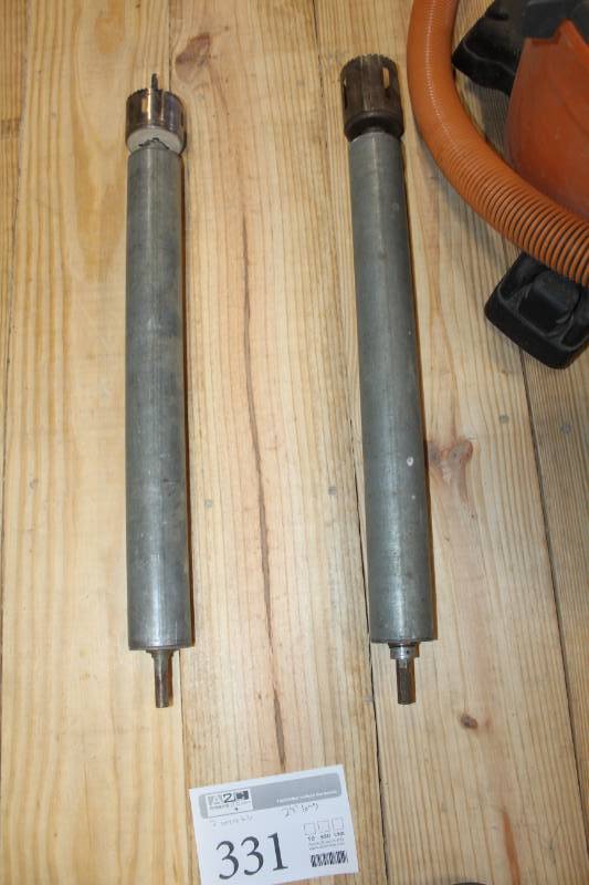 lot 331 image: Two hole saws with bearing mount extensions.