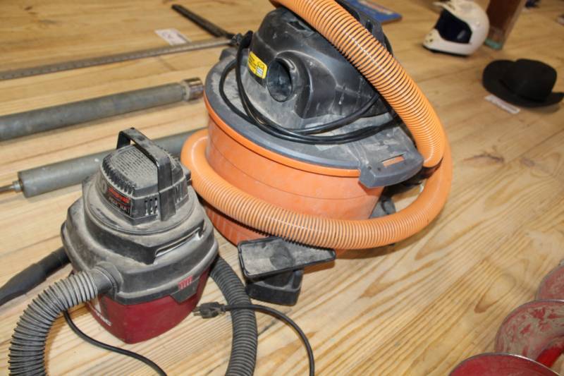 lot 332 image: Shop Vacuums, First is a Rigid brans, Second is Shop Vac brand. Both in working order.
