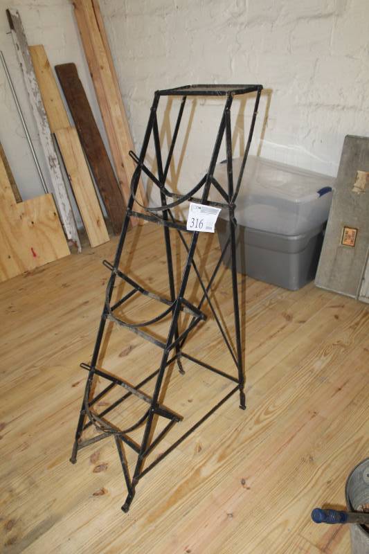 lot 316 image: Antique water bottle holding stand.