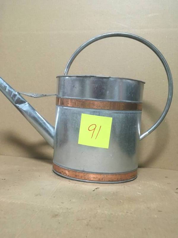 23.2 in. x 7.36 in. x 15.75 in. 2 gal. Silver Metal Watering Can in very good condition