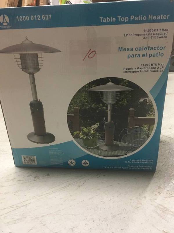 lot 10 image: Hampton Bay 11,000 BTU Powder Coated Bronze Tabletop Propane Patio Heater in good condition