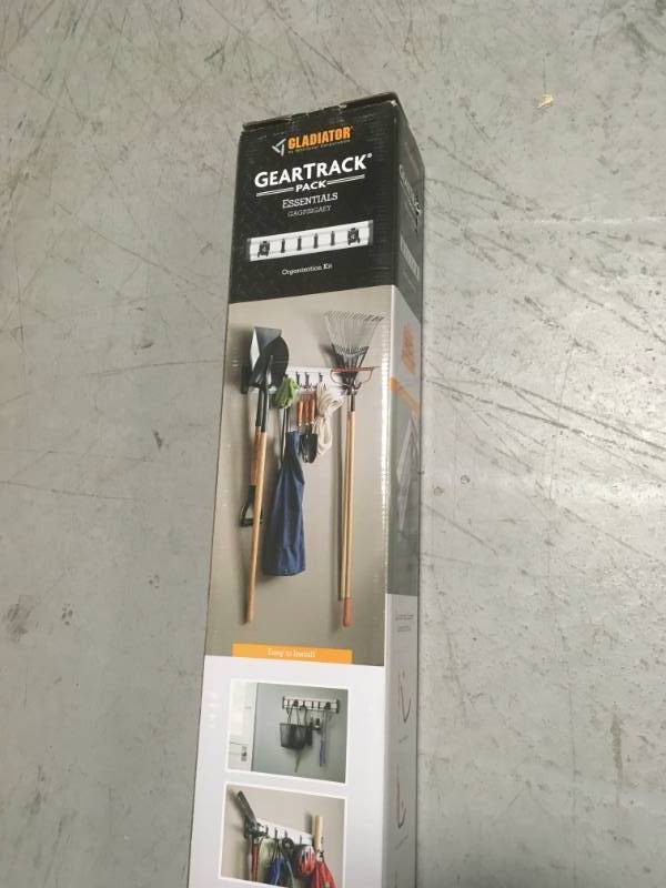 lot 27 image: Gladiator GAGP32GAEY 32 in. L GearTrack Garage Wall Storage Kit with 6-Hooks in good condition