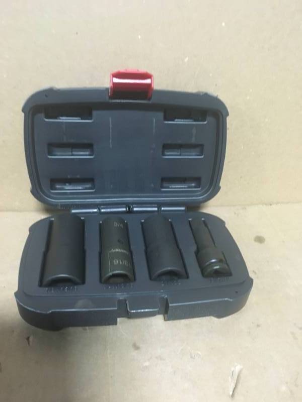 lot 40 image: Husky 12 in. Drive Impact Flip Socket Set (4 Piece) one pc are damage