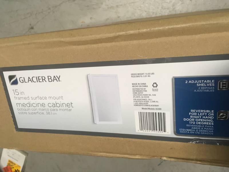 lot 86 image: Glacier Bay 15-14 in. W x 26 in. H Framed Surface-Mount Bathroom Medicine Cabinet in White in good condition