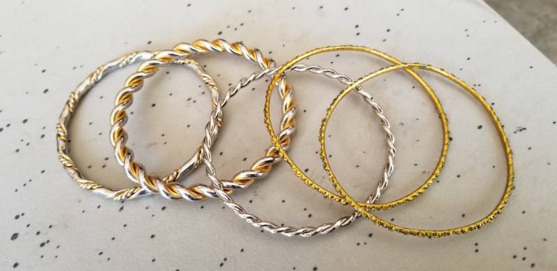 lot 12 image: Womens Gold Tone Bangle Style Bracelets