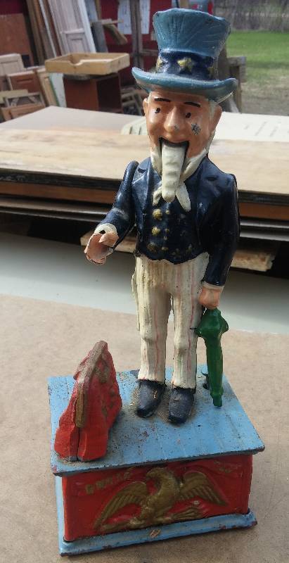 lot 99 image: Antique Coin Bank, metal