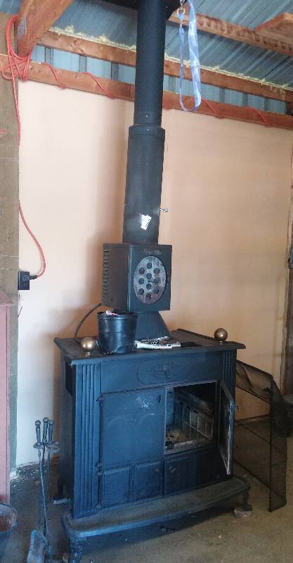 lot 115 image: Large Cast Iron Wood Burning Shop Stove Heater. See notes