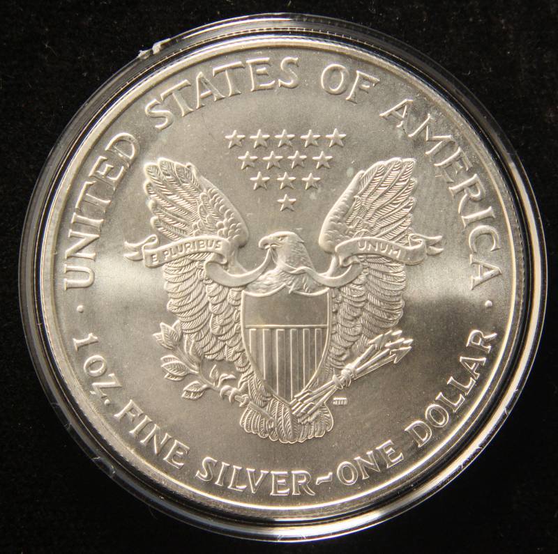 lot 44 image: 1999 AMERICAN SILVER EAGLE 1 TROY OZ. .999 FINE SILVER IN AIRTITE