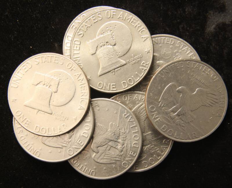 lot 50 image: GROUP OF 8 CLAD EISENHOWER DOLLARS