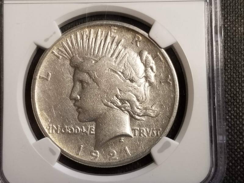 lot 05-A image: 1921 PEACE SILVER DOLLAR NGC CERTIFIED
