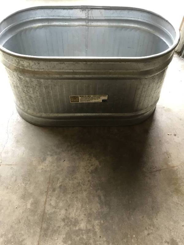 Behlen county stainless steel water tank looks like 90 gallon.