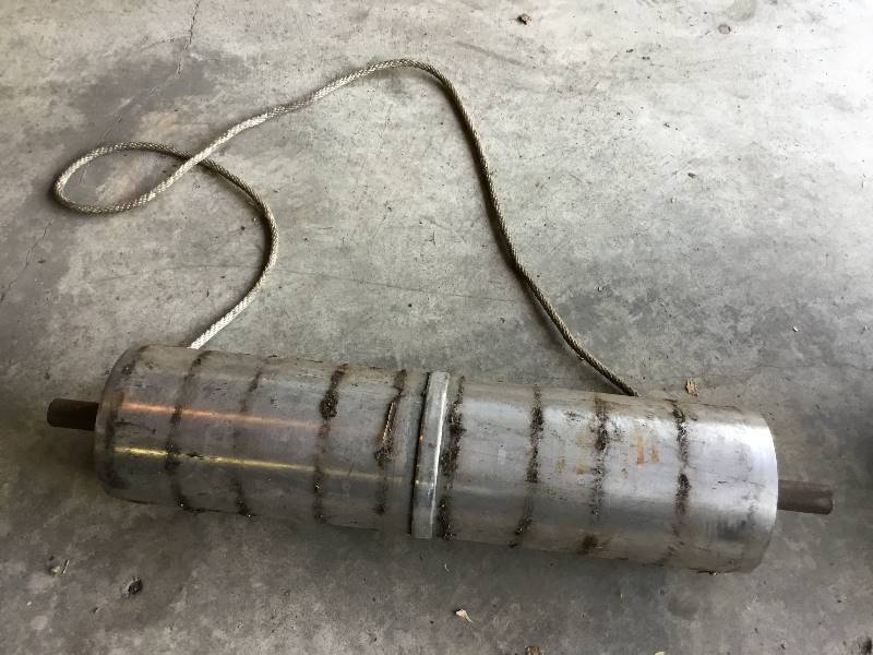 Large magnet for picking up metal scarps in yard on construction site