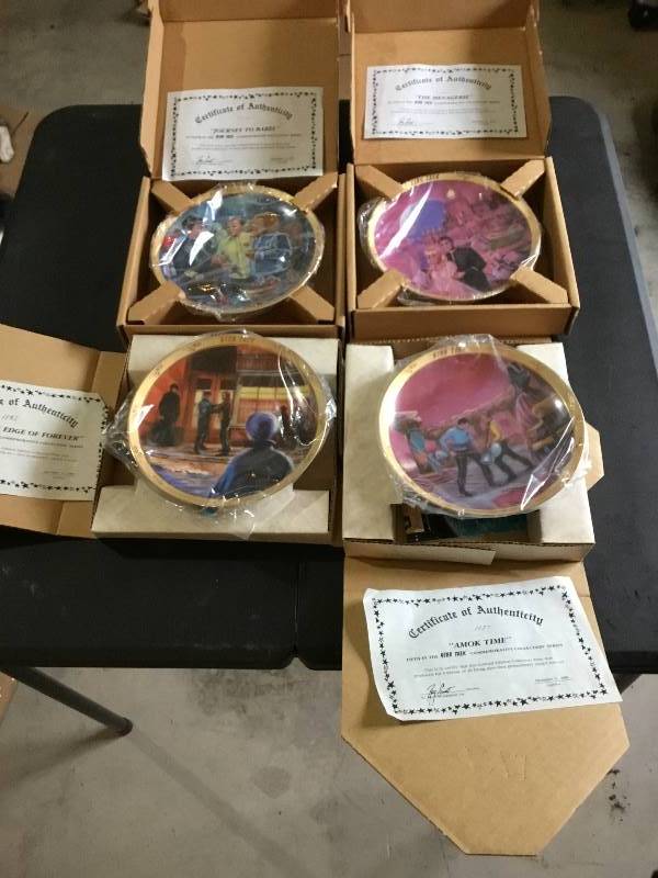 4 Star Trek Collector plates with certificates and boxes.