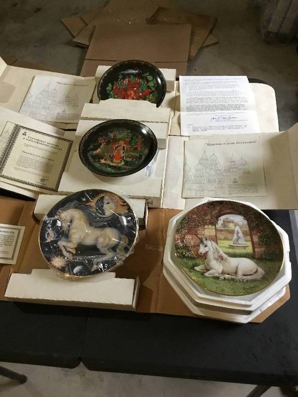 4 Collector plates 2 unicorns and 2 Russian plates, papers and boxes.